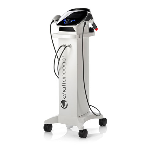 Shockwave therapy being applied to a patient's lower leg
